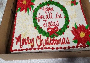 A photo of the Christmas cake from our banquet.